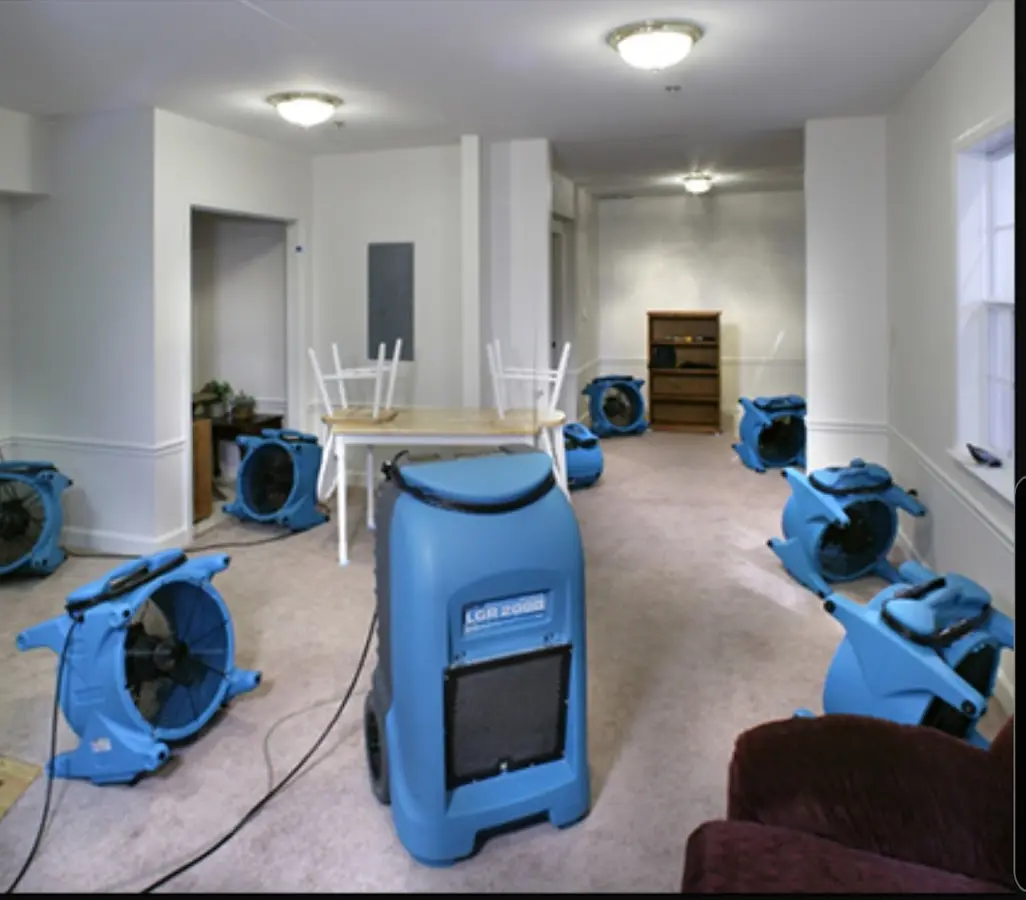 Air movers and dehumidifier setup for Water Damage Restoration in Beatrice